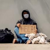 Poor man in mask
